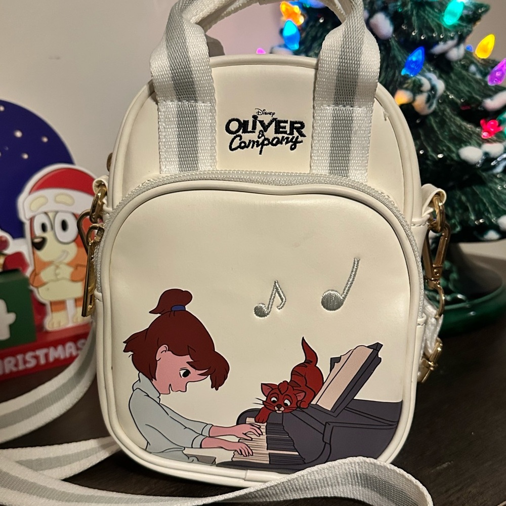 UV color changing Oliver and Company crossbody bag